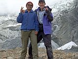 309 Gyan Tamang and Jerome Ryan Near Annapurna North Icefall The French moved their base camp to the north Annapurna icefall when they decided to attack the north face. Gyan Tamang and Jerome Ryan trudged along, sometimes on the lateral moraine, but there was a regular volley of falling rocks coming down the steep side of the hill opposite the glacier. One ricocheted cross the path only 10m in front of us - I thought this must what it's like on the Eiger.